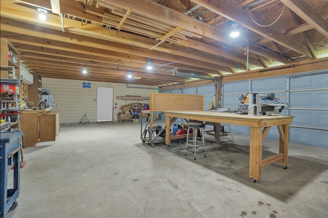 511 Northwood Dr, Conroe, TX 77303 - basement featuring a workshop area and a garage
