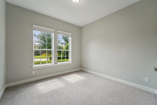 103 Catesby Ct, Conroe, TX 77304 - carpeted spare room with baseboards