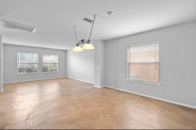 18222 Winding Timbers Ln, Humble, TX 77346 - empty room featuring concrete floors and baseboards