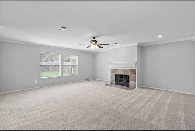 18222 Winding Timbers Ln, Humble, TX 77346 - unfurnished living room featuring crown molding, carpet flooring, a fireplace, ceiling fan, and baseboards
