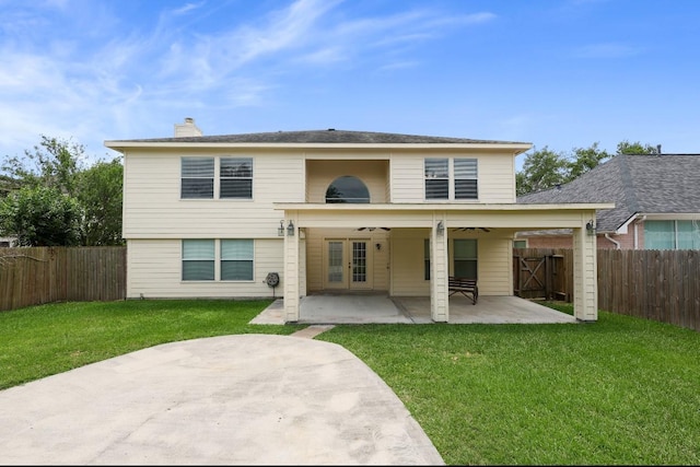 18222 Winding Timbers Ln, Humble, TX 77346 - back of property featuring a patio area, a ceiling fan, french doors, and a chimney