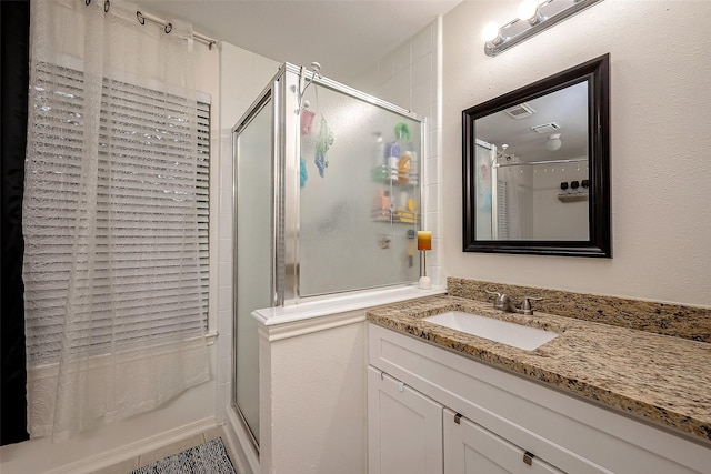 8719 Rose Garden Dr, Houston, TX 77083 - bathroom with an enclosed shower and vanity