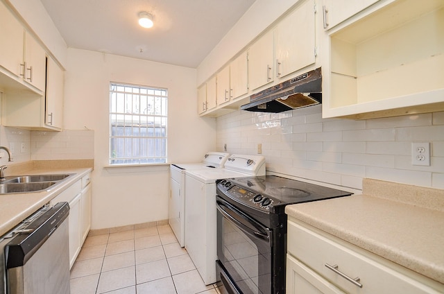 9350 Country Creek Dr Unit 5, Houston, TX 77036 - kitchen with stainless steel dishwasher, under cabinet range hood, independent washer and dryer, black / electric stove, and a sink