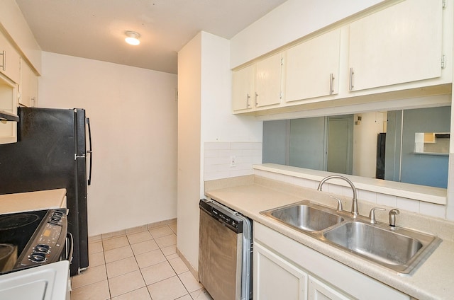 9350 Country Creek Dr Unit 5, Houston, TX 77036 - kitchen with stainless steel dishwasher, a sink, light countertops, electric range, and light tile patterned flooring