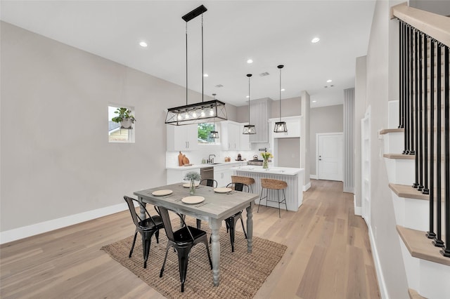 407 Sikes St, Houston, TX 77018 - dining area with light wood-type flooring and recessed lighting