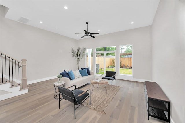 407 Sikes St, Houston, TX 77018 - living room with light wood-style floors, a ceiling fan, stairs, and recessed lighting