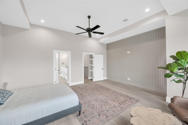 407 Sikes St, Houston, TX 77018 - bedroom featuring baseboards, wood finished floors, recessed lighting, a ceiling fan, and ensuite bath