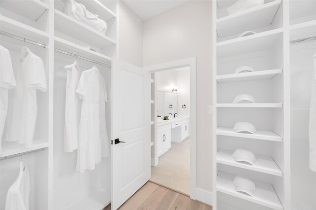 407 Sikes St, Houston, TX 77018 - spacious closet featuring light wood-style floors