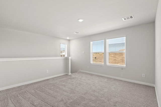 32923 Turning Springs Dr, Fulshear, TX 77423 - unfurnished room with baseboards, light colored carpet, and recessed lighting