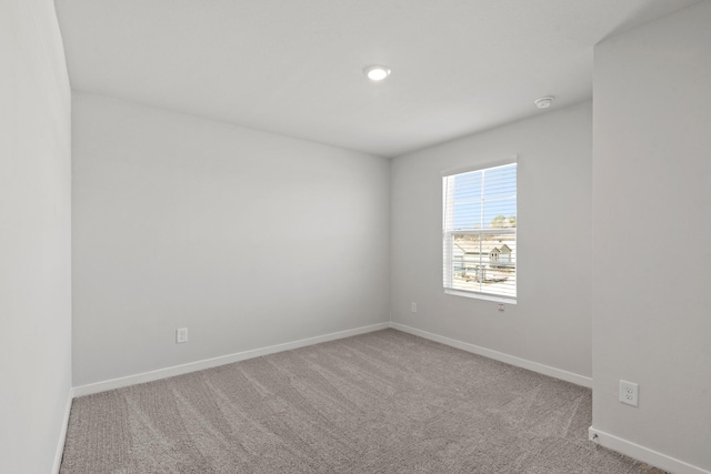 32923 Turning Springs Dr, Fulshear, TX 77423 - empty room featuring carpet floors, baseboards, and a smoke detector