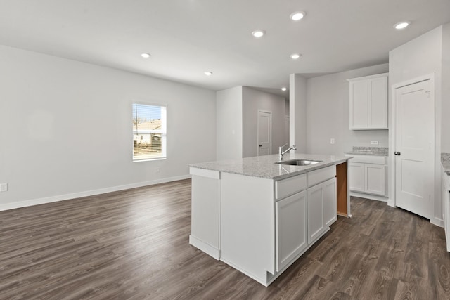 32923 Turning Springs Dr, Fulshear, TX 77423 - kitchen with a sink, white cabinetry, recessed lighting, a kitchen island with sink, and dark wood-style floors