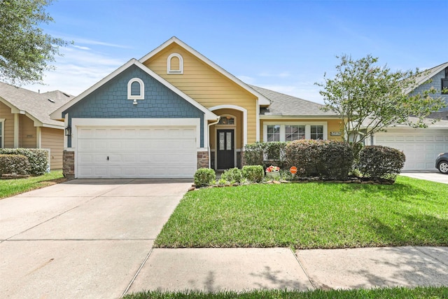 2918 Bright Sky Ct, Spring, TX 77386 - view of front of property with an attached garage, a front lawn, concrete driveway, and stone siding