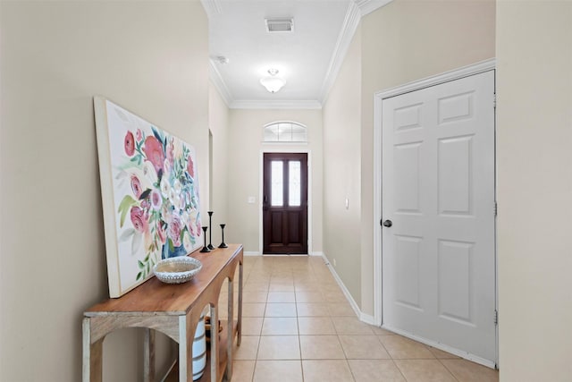 2918 Bright Sky Ct, Spring, TX 77386 - foyer with ornamental molding, light tile patterned floors, and baseboards