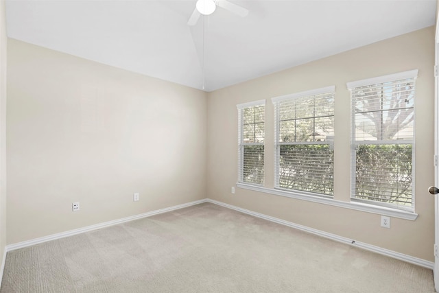 2918 Bright Sky Ct, Spring, TX 77386 - spare room with light colored carpet, baseboards, a ceiling fan, and vaulted ceiling