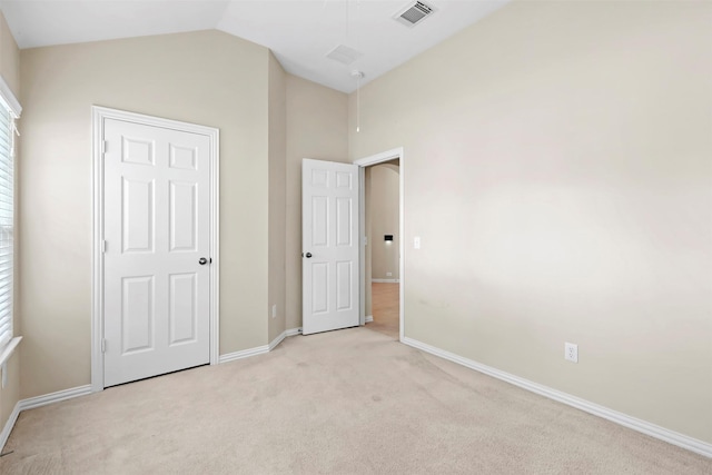 2918 Bright Sky Ct, Spring, TX 77386 - unfurnished bedroom featuring light colored carpet, vaulted ceiling, and baseboards