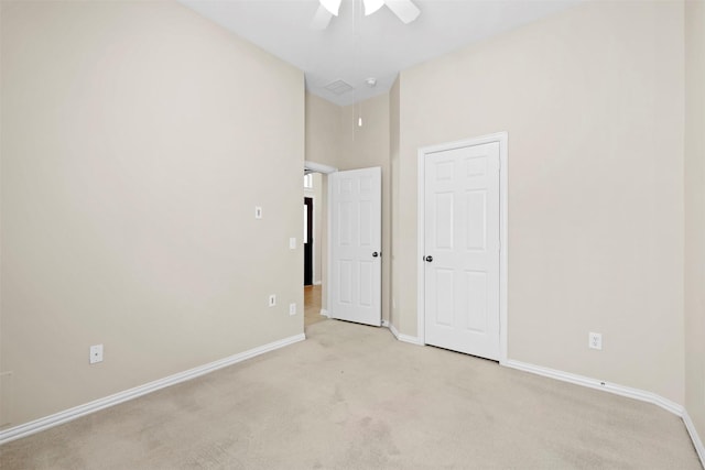 2918 Bright Sky Ct, Spring, TX 77386 - unfurnished bedroom featuring light colored carpet, baseboards, and ceiling fan