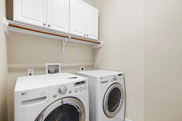 2918 Bright Sky Ct, Spring, TX 77386 - laundry room with cabinet space and washer and dryer