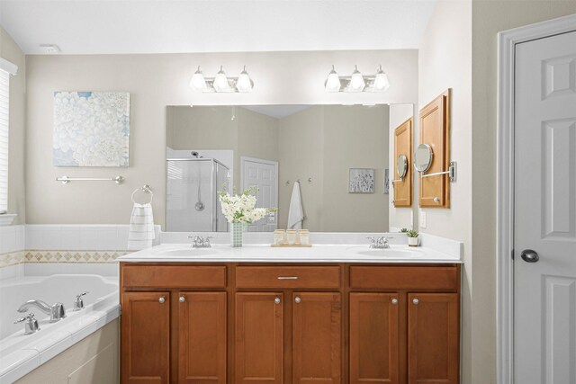 2918 Bright Sky Ct, Spring, TX 77386 - bathroom with a shower stall, a bath, and double vanity