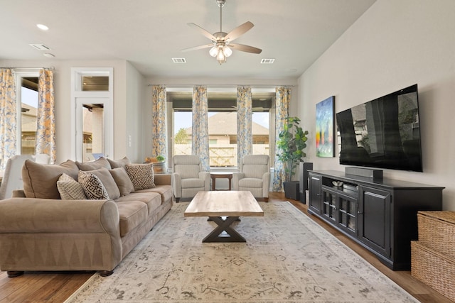 5118 Pomegranate Path, Manvel, TX 77578 - living area with wood finished floors, a ceiling fan, and recessed lighting