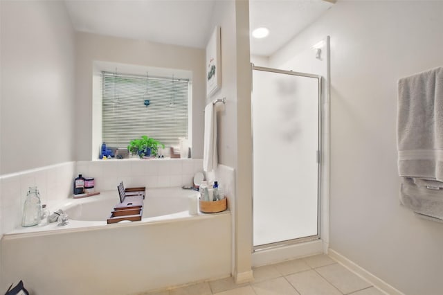 30915 Caraquet Ct, Spring, TX 77386 - bathroom featuring a stall shower, tile patterned floors, and a garden tub