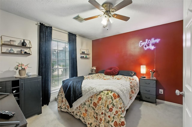 30915 Caraquet Ct, Spring, TX 77386 - bedroom with light colored carpet, a ceiling fan, a textured ceiling, and baseboards