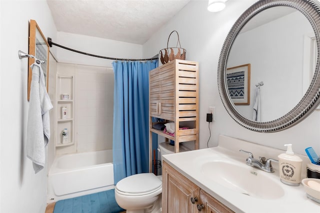 23718 E Webb Rd, Porter, TX 77365 - bathroom with shower / bath combo with shower curtain, vanity, toilet, and a textured ceiling