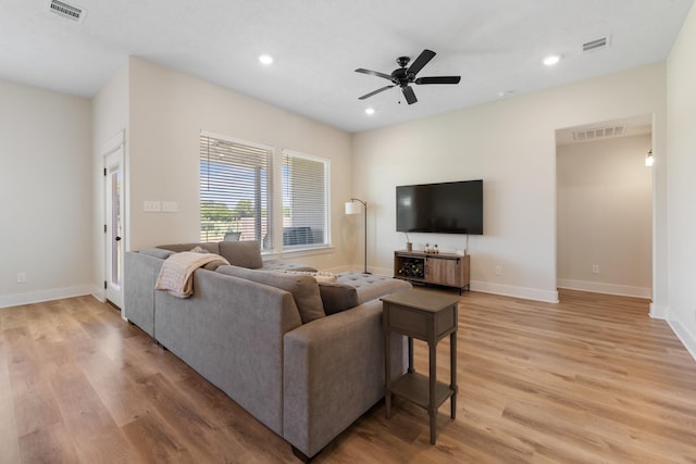 263 Brazos Bnd, Snook, TX 77879 - living area featuring light wood-style flooring, recessed lighting, a ceiling fan, and baseboards