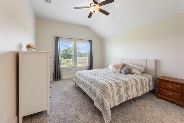 263 Brazos Bnd, Snook, TX 77879 - carpeted bedroom with vaulted ceiling and a ceiling fan