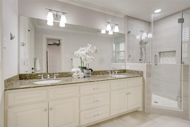 4414 Arnell Dr, Houston, TX 77018 - bathroom with crown molding, a shower stall, double vanity, and tile patterned flooring