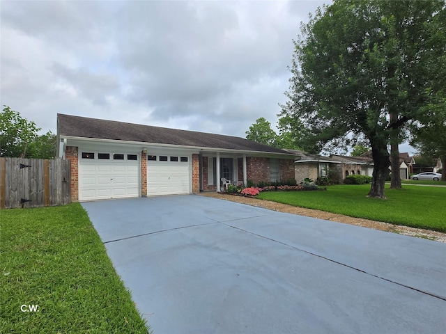 11834 Mulholland Dr, Meadows Place, TX 77477 - view of front of home featuring driveway, brick siding, and an attached garage