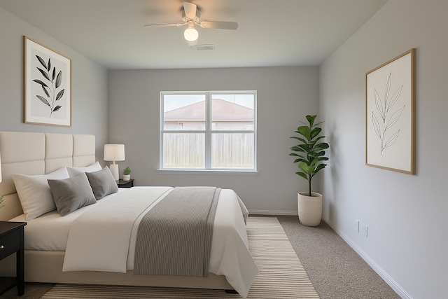 2507 Ocean Cove Cir, Rosenberg, TX 77469 - bedroom with carpet flooring, baseboards, and ceiling fan