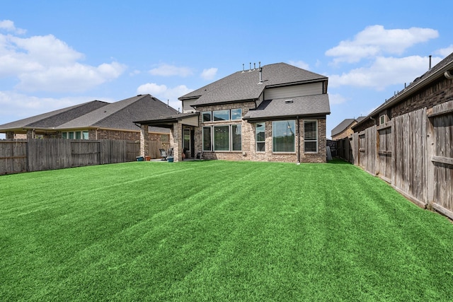 5711 Greenwood Colony Ct, Houston, TX 77059 - back of house featuring a shingled roof and brick siding
