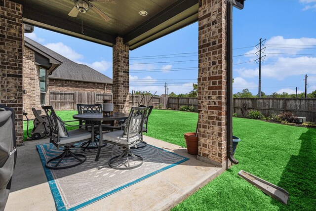 5711 Greenwood Colony Ct, Houston, TX 77059 - view of patio featuring a ceiling fan and outdoor dining space