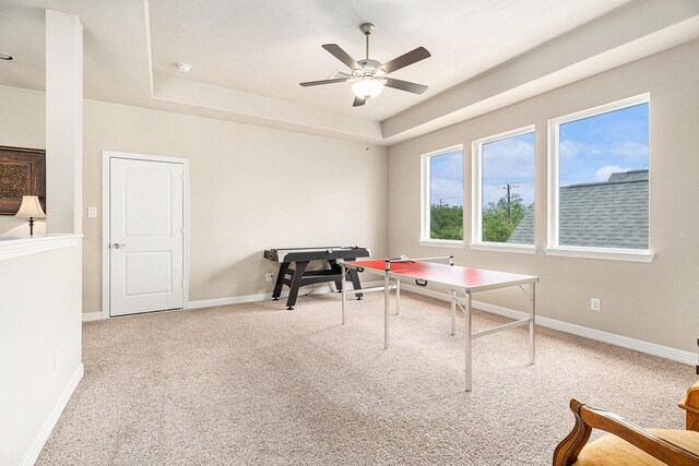 5711 Greenwood Colony Ct, Houston, TX 77059 - recreation room featuring carpet flooring, a raised ceiling, ceiling fan, and baseboards