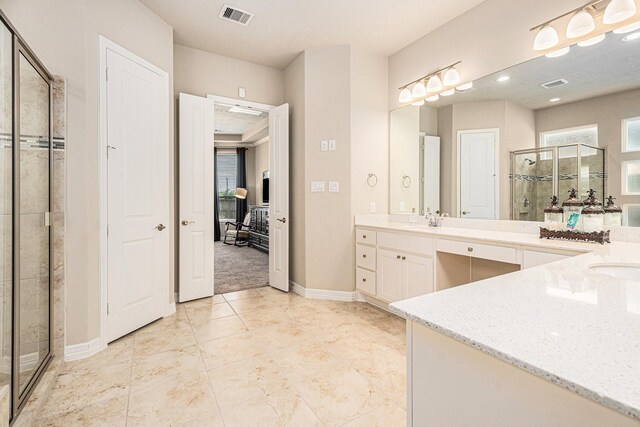 5711 Greenwood Colony Ct, Houston, TX 77059 - bathroom featuring a shower stall, vanity, and baseboards