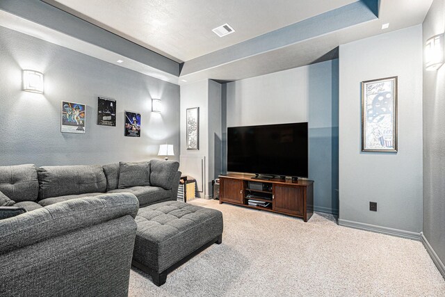 5711 Greenwood Colony Ct, Houston, TX 77059 - living area with light carpet, baseboards, and a raised ceiling
