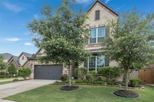 5711 Greenwood Colony Ct, Houston, TX 77059 - view of front facade with stone siding, concrete driveway, and a garage