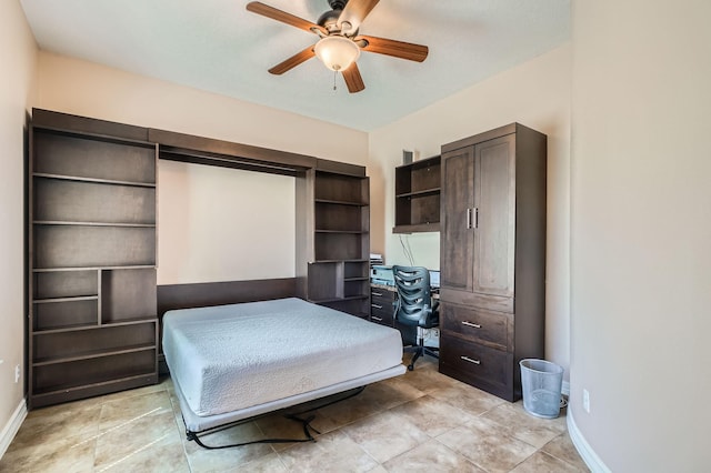 1102 Nautical Ln, Richmond, TX 77469 - bedroom featuring baseboards, a desk, and ceiling fan