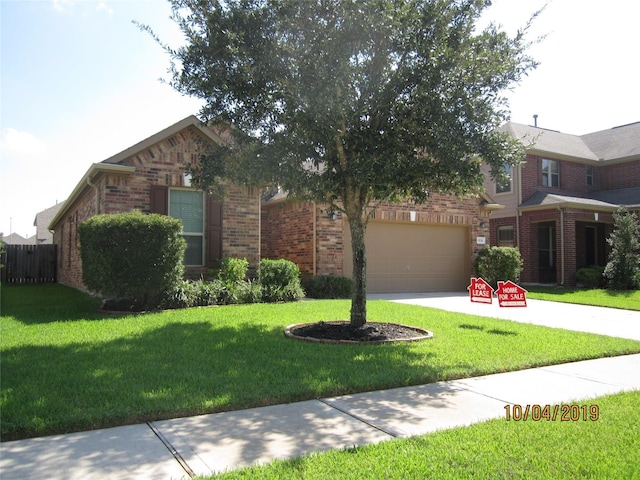 11030 Jacob Crossing Dr, Richmond, TX 77406 - view of front of property featuring brick siding, a front yard, and driveway