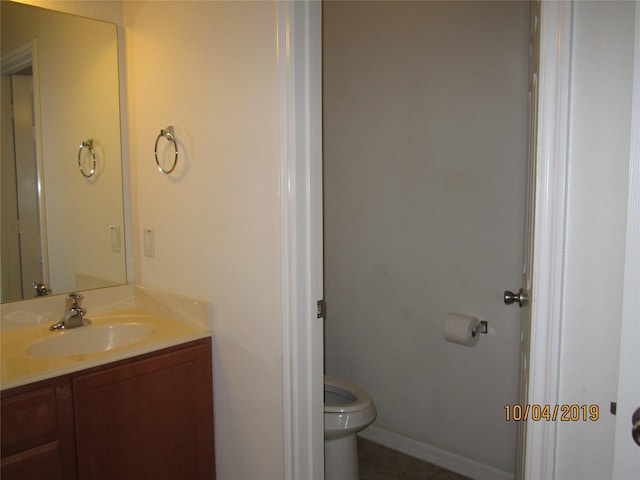 11030 Jacob Crossing Dr, Richmond, TX 77406 - bathroom featuring vanity, toilet, baseboards, and tile patterned floors
