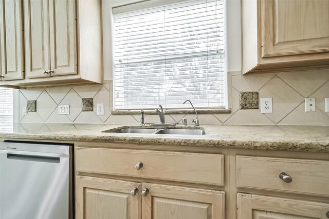 13331 Brentonwood Ln, Houston, TX 77077 - kitchen with dishwasher, a sink, light brown cabinets, and backsplash