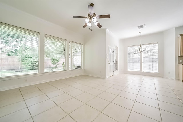 13331 Brentonwood Ln, Houston, TX 77077 - unfurnished room featuring plenty of natural light, a chandelier, light tile patterned flooring, and a ceiling fan