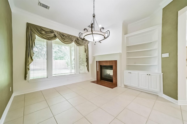 13331 Brentonwood Ln, Houston, TX 77077 - unfurnished living room featuring crown molding, a chandelier, built in features, baseboards, and a tile fireplace