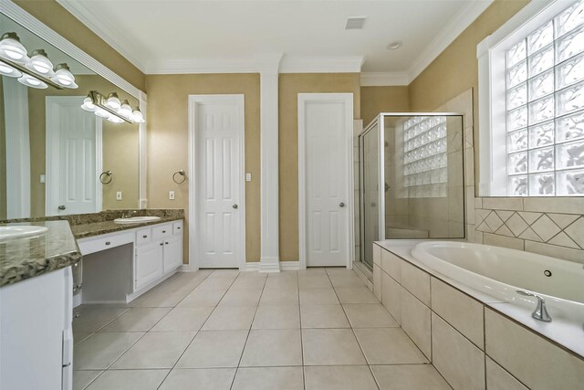 13331 Brentonwood Ln, Houston, TX 77077 - bathroom featuring vanity, a stall shower, a bath, tile patterned floors, and ornamental molding