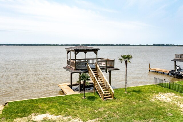3623 Shore Shadows Dr, Crosby, TX 77532 - dock area with a gazebo, a water view, and a yard