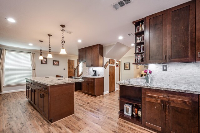 3623 Shore Shadows Dr, Crosby, TX 77532 - kitchen featuring open shelves, recessed lighting, decorative backsplash, dark brown cabinetry, and crown molding