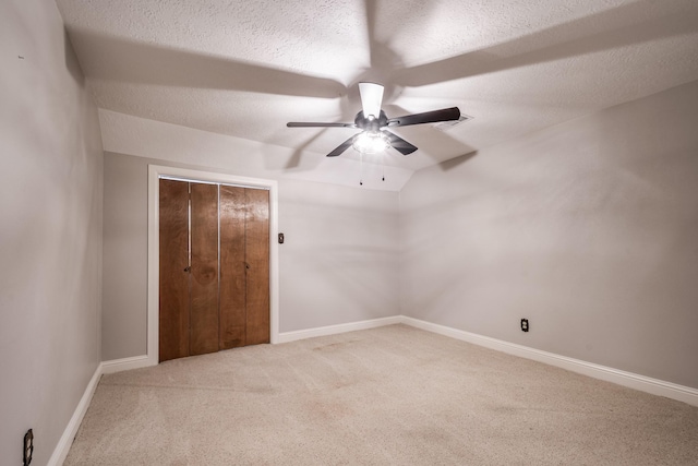 3623 Shore Shadows Dr, Crosby, TX 77532 - spare room featuring carpet flooring, a ceiling fan, a textured ceiling, and baseboards