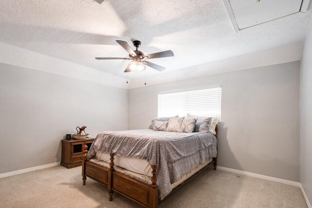 3623 Shore Shadows Dr, Crosby, TX 77532 - bedroom featuring light carpet, a textured ceiling, baseboards, and ceiling fan