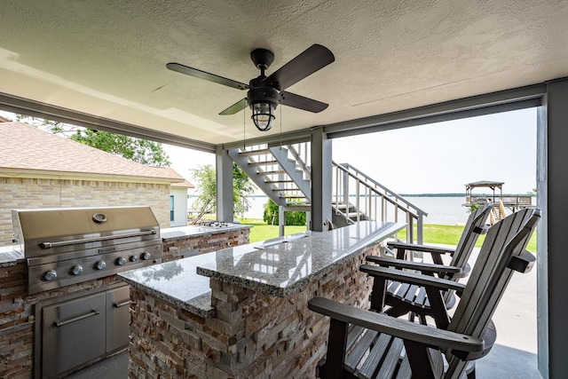3623 Shore Shadows Dr, Crosby, TX 77532 - view of patio / terrace featuring stairs, a water view, and a ceiling fan