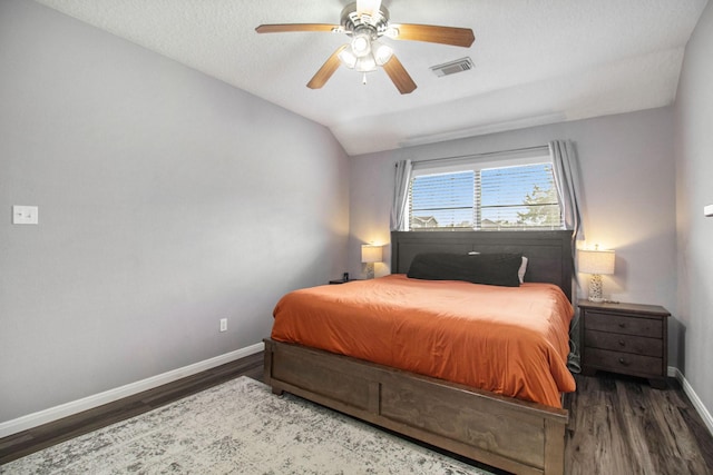19198 County Road 669e, Alvin, TX 77511 - bedroom featuring wood finished floors, baseboards, lofted ceiling, and ceiling fan